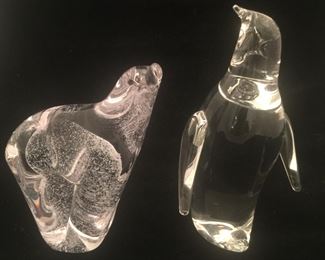 A polar bear and penguin by Steuben Glass. 