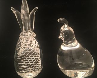 A pineapple with a helix-like design and a quail by Steuben Glass. 