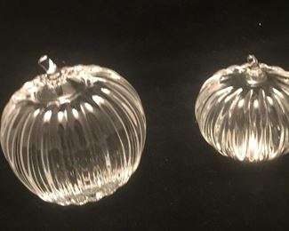A pair of pumpkins, offered individually.