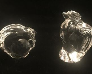 Farm fowl figures including a turkey, left, and a rooster. 