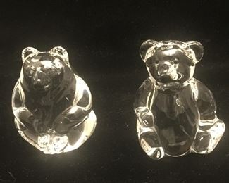 A bear along with a teddy bear. 