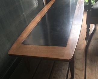 MCM coffee table likely by Henredon features a smooth finish with black inset on top. Also available are matching end tables and buffet. 