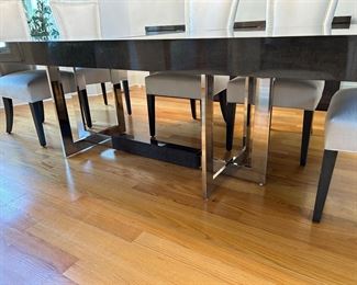 City Dining Table by Hurtado. 47" wide x 104" long (pictured with one leaf, one additional leaf included) stainless steel base