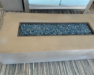56” x 26” fire table. includes hose to propane tank cover