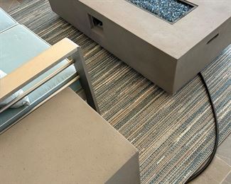 56” x 26” fire table. includes hose to propane tank cover/cube