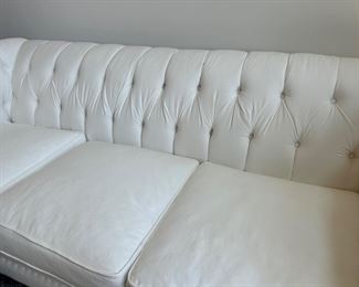 white Chesterfield sofa by Klaussner Distinctions. 93" long, 41"tall.