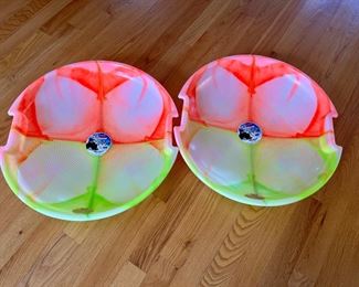 2 sledding saucers 