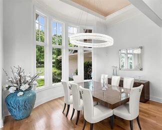 City Dining Table by Hurtado. 47" wide x 104" long (pictured with one leaf, one additional leaf included) stainless steel base