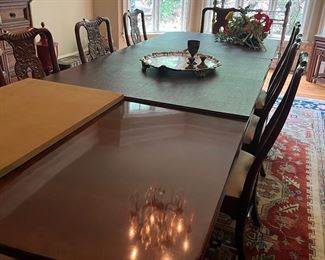 Drexel Heritage dining table with 8 chairs. It could seat 4 more. Comes with table pads.  Excellent condition