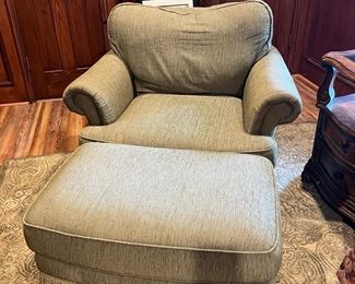 This chair and ottoman is by Schndig club chair and ottoman. Used very little