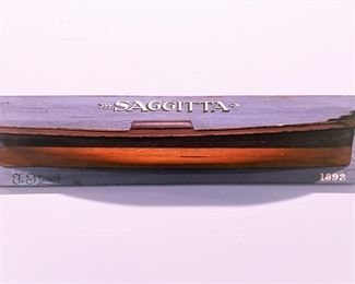Early to mid 20th century  half hull model ship  of 1890s Saggitta with 'lift' layers. This was purchased several decades ago in Maine.  