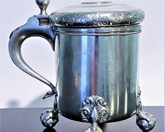 Antique claw on ball footed pewter tankard 