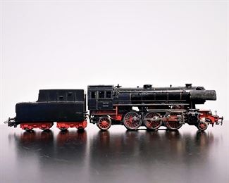 Vintage toy steam train by Marklin.  Engine 23014 with tender of the German Federal Railways Class 23 train engine