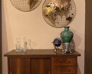 Mid century modern console along with mid century Hollywood Regency  Hemisphere Sculpture wall art World Globe by C Jeré of Los Angeles, California.  These were purchased in the early 1980s by the family for their 1st Travel Agency.   