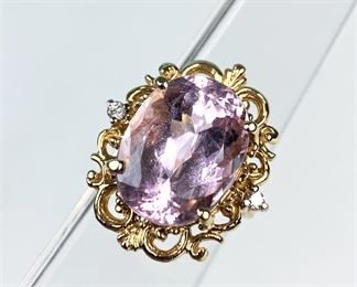 14k yellow gold ring, marked TAL, with a light amethyst or rose quartz stone stetting