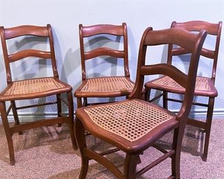 Victorian side chairs with woven rush seats which are in firm condition 