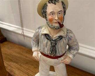 Antique Staffordshire figure of a sailor,