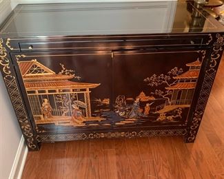 #3	Japanese Hand-Painted Black Lacquer Table w/pull-out Tray w/2 doors & 1 shelf - 18.5x41.5x30  (as is small Finish on top)	 $400.00 
