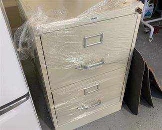 #58	Staples 2 drawer Legal File Cabinet w/key	 $25.00 
