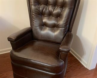#77	Brown Naugaide Recliner w/button Back (not continuous foot)	 $75.00 
