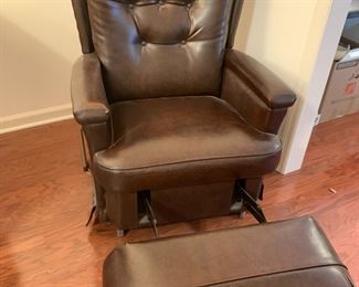 #77	Brown Naugaide Recliner w/button Back (not continuous foot)	 $75.00 
