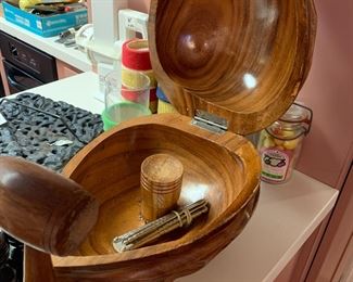 #120	Wood Nut Bowl that opens with nutcrackers	 $40.00 
