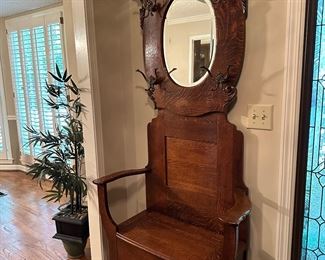 Early 20th century oak hall tree with bench.  