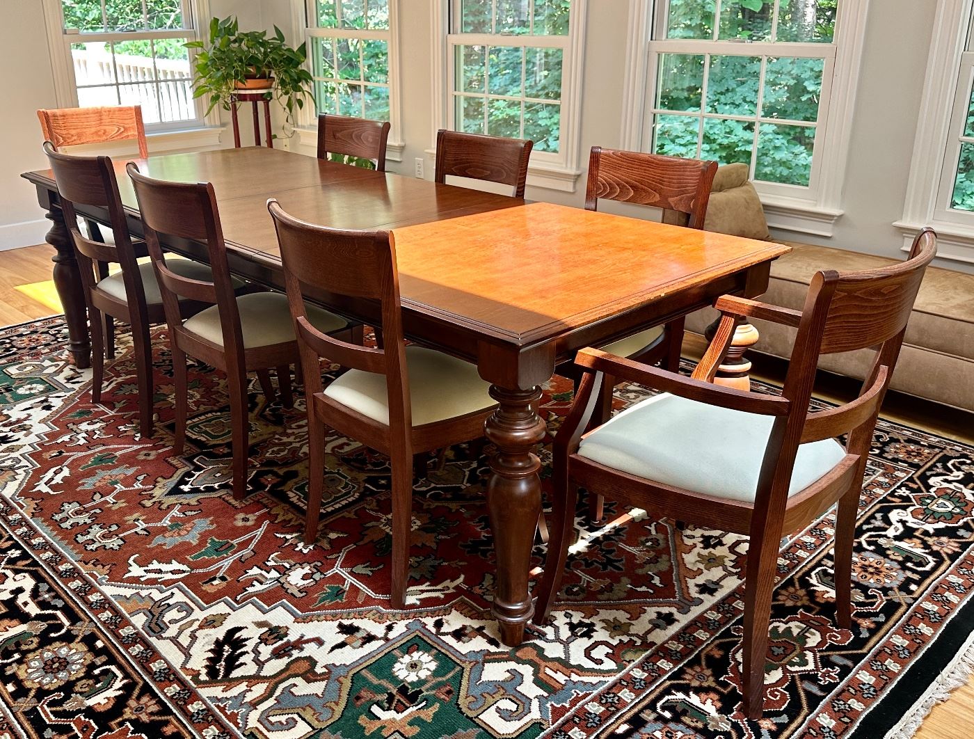 Restoration Hardware Dining Table and (8) Pottery Barn Chairs (The whole table is the darker wood - that is just the sun making it look like a different color on the right!)
