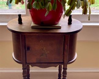 Antique wooden smoking station; Christmas cactus