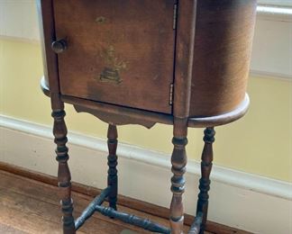 Antique wooden smoking station; Christmas cactus