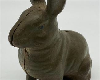 Antique metal bunny coin bank