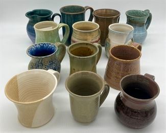 Assorted pottery mugs, including Mack Chrisco, Turn and Burn pottery, Uwharrie Crystalline Pottery, Daniel Marley, Mike Ferree, Hickory Hill, Jug or Not Pottery