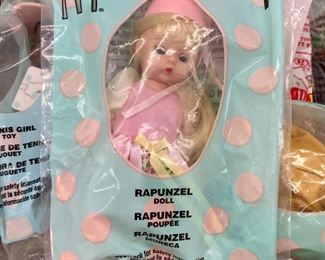 Assorted packaged McDonald's Happy Meal toys including Madame Alexander, Smurfs, Cosmix, SpyBoy