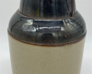 Unsigned pottery crock with lid