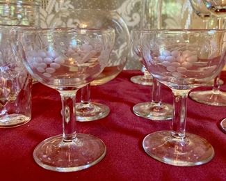 Assorted vintage glass and crystal stemware, juice glasses, cordials