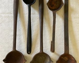Vintage cast iron ladels