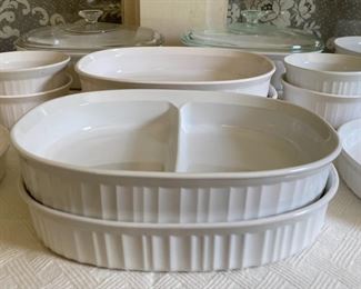 Assorted white CorningWare baking and storage pieces