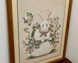 Rabbit in flower basket framed print