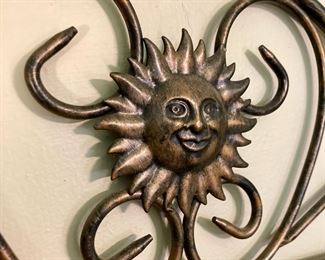 Metal sun motif wall basket