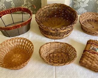 Assorted wood, wire and wicker baskets and hanging baskets