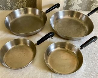 Assorted Revere Ware frying pans