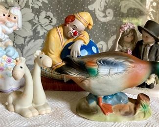 Assorted vintage figurines; Precious Moments, Emmitt Kelly