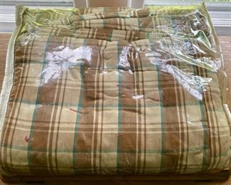 Various quilts, from patchwork and hand-sewn to modern