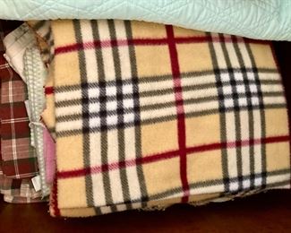 Various blankets, throws and bedding, from hand-sewn to modern