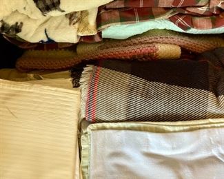 Various blankets, throws and bedding, from hand-sewn to modern
