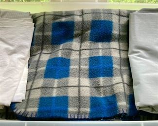 Various blankets, throws and bedding, from hand-sewn to modern