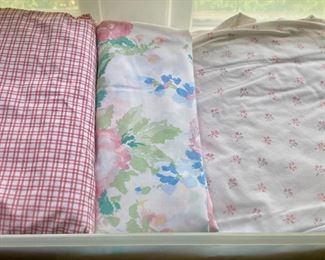 Various blankets, throws and bedding, from hand-sewn to modern