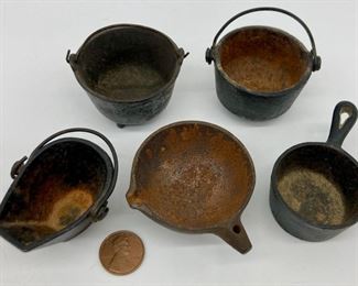 Vintage cast iron buckets and pots