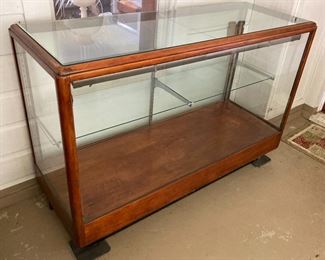 Vintage wooden display case with glass top, sides and shelf