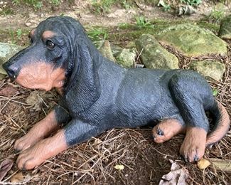 Resin lounging dog lawn ornament
